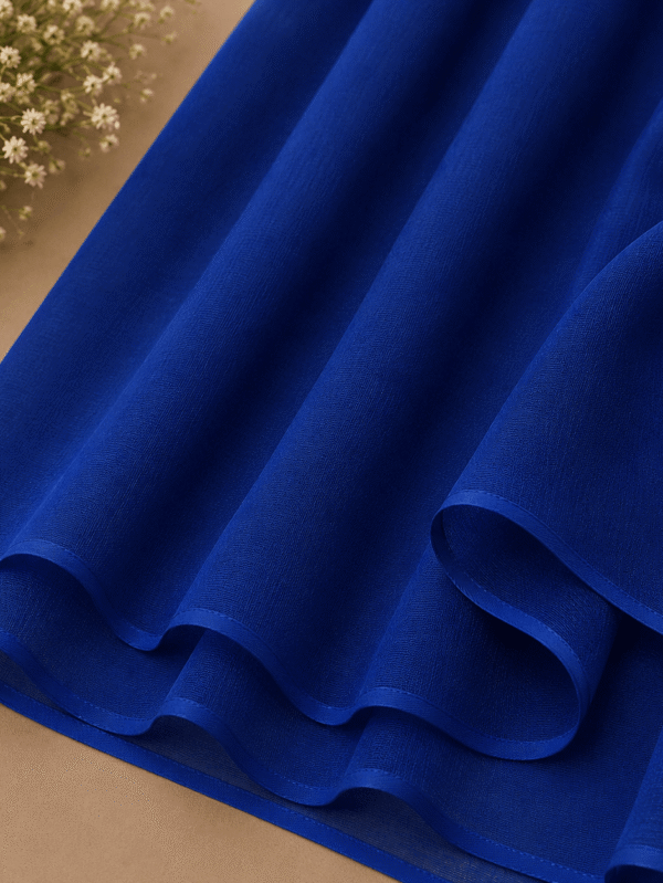 Royal blue georgette chiffon hijab draped boldly — RidaZe 2. Cobalt blue lightweight chiffon staller for university and formal wear — RidaZe 3. Close-up texture of royal blue georgette hijab fabric — RidaZe Pakistan