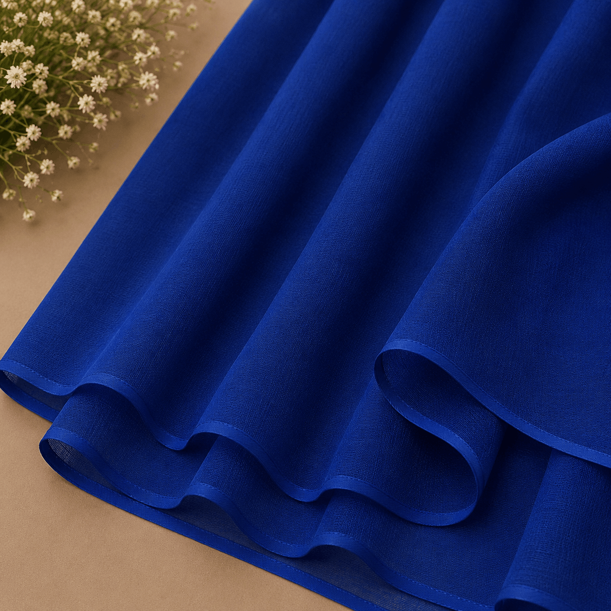 Royal blue georgette chiffon hijab draped boldly — RidaZe 2. Cobalt blue lightweight chiffon staller for university and formal wear — RidaZe 3. Close-up texture of royal blue georgette hijab fabric — RidaZe Pakistan
